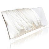 An ivory ruched satin wedding day clutch with a smooth glossy finish.