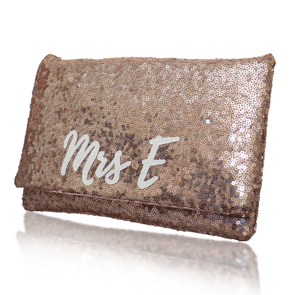 Rose gold sequin clutch deals