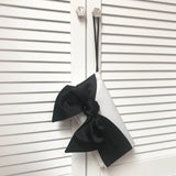 Ivory and black bow clutch handbag for mother of the bride
