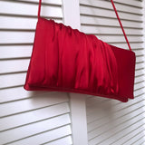 Red satin handbag clutch