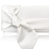 ivory bow clutch for brides on wedding day