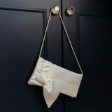 wedding handbag in ivory satin with bow and shoulder strap