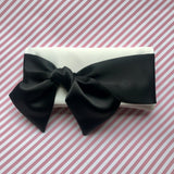 ivory satin clutch handbag with black bow