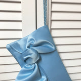 bow clutch handbag in pale blue satin