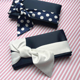 navy ivory satin clutch handbag with bow